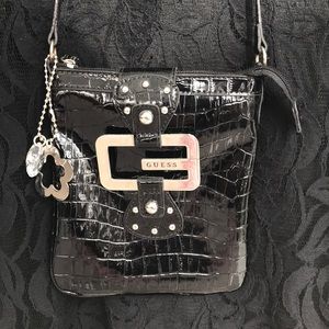 Shoulder cross body faux patent bag
